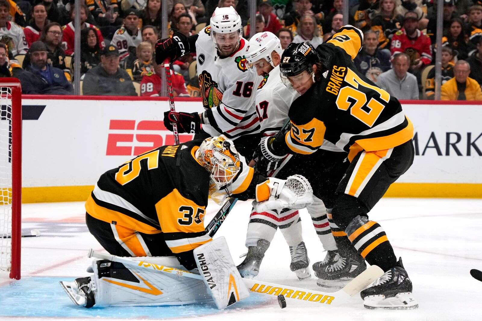 Connor Bedard picks up an assist in his NHL debut as the Blackhawks rally  past Crosby, Penguins 4-2