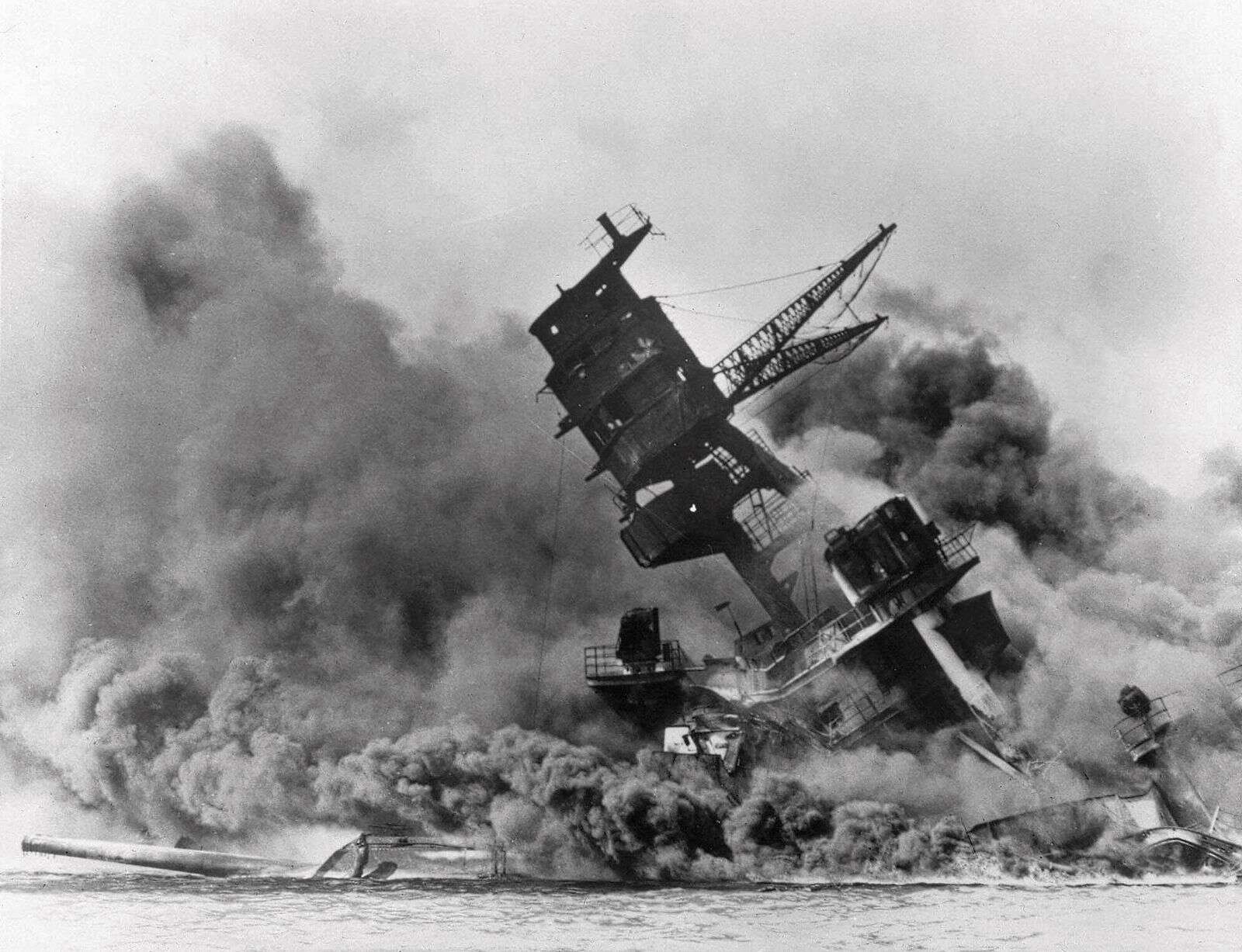 Smoke rises from the battleship USS Arizona as it sinks during the Japanese attack on Pearl Harbor