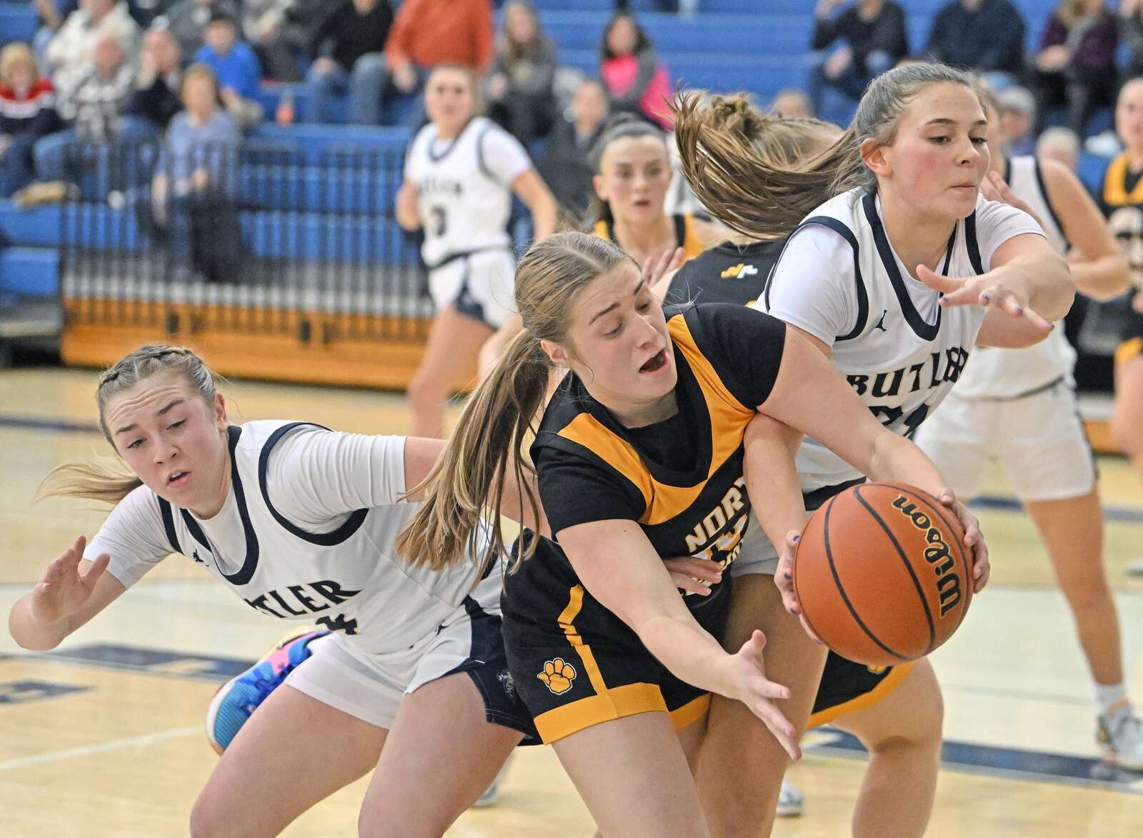 Butler’s Avery Maier and Cameryn Booher fight for a rebound 