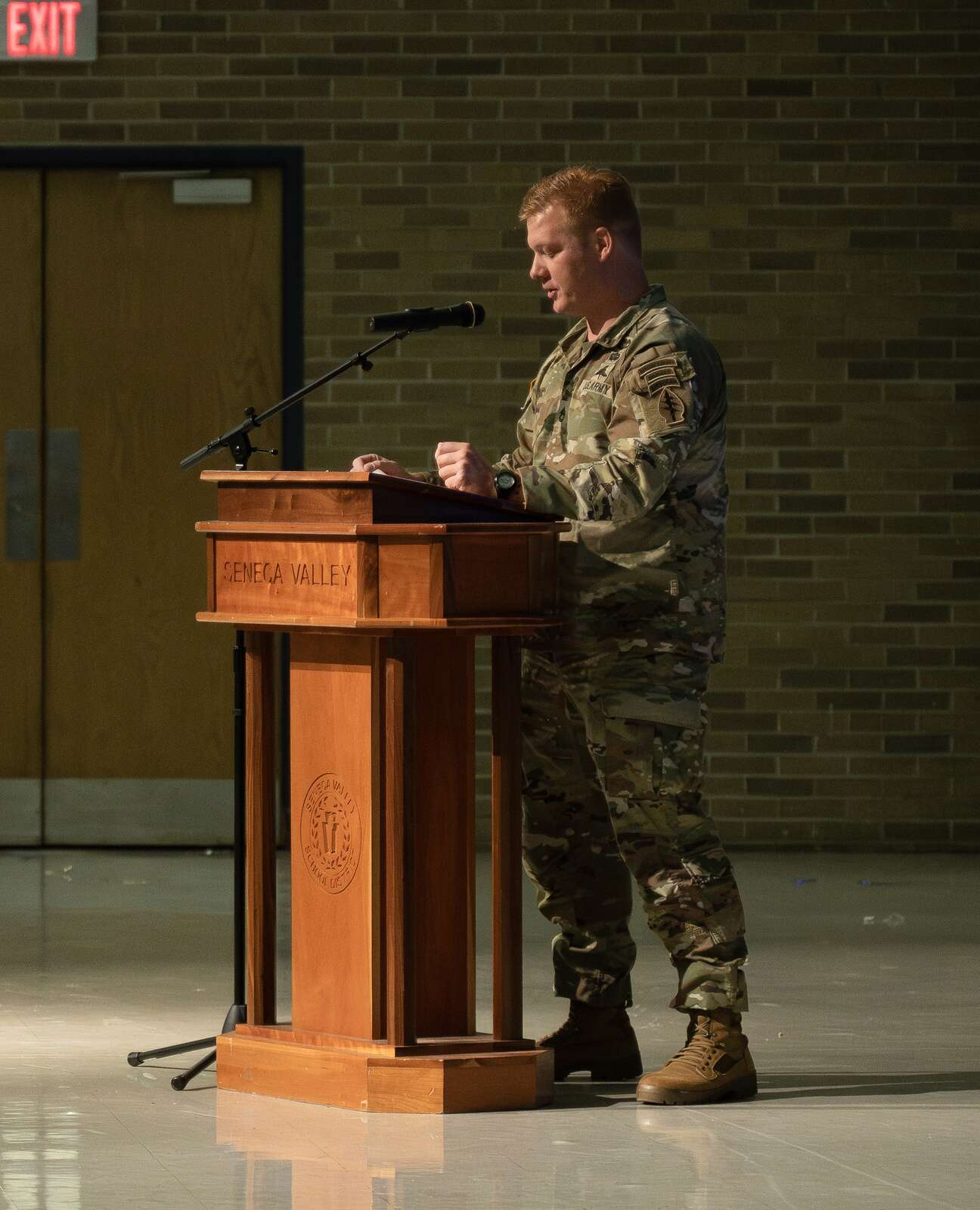 A member of the Green Berets speaks during a ceremony