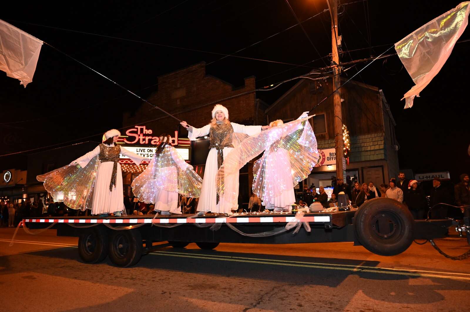 Event organizer Carol Ziegler on her float at the Miracle on Main parade