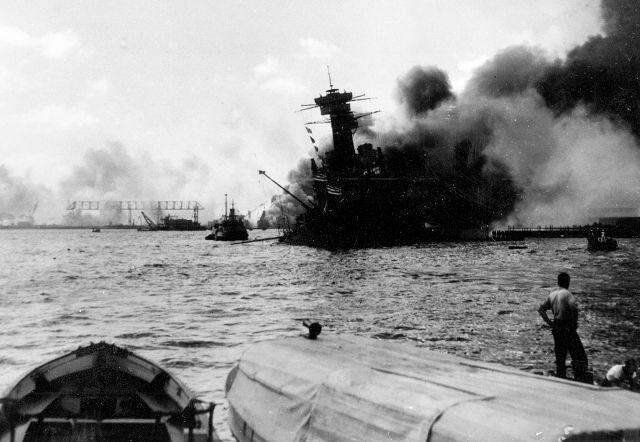 The battleship USS California burns during the Japanese aerial attack