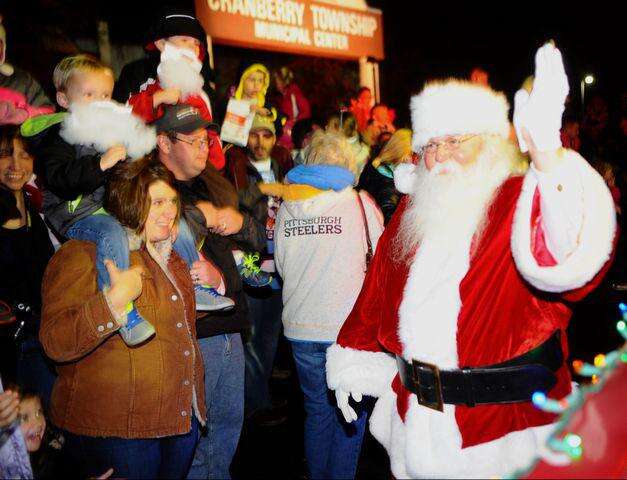 Santa Claus is greeted by children of all ages upon his arrival in Cranberry Township