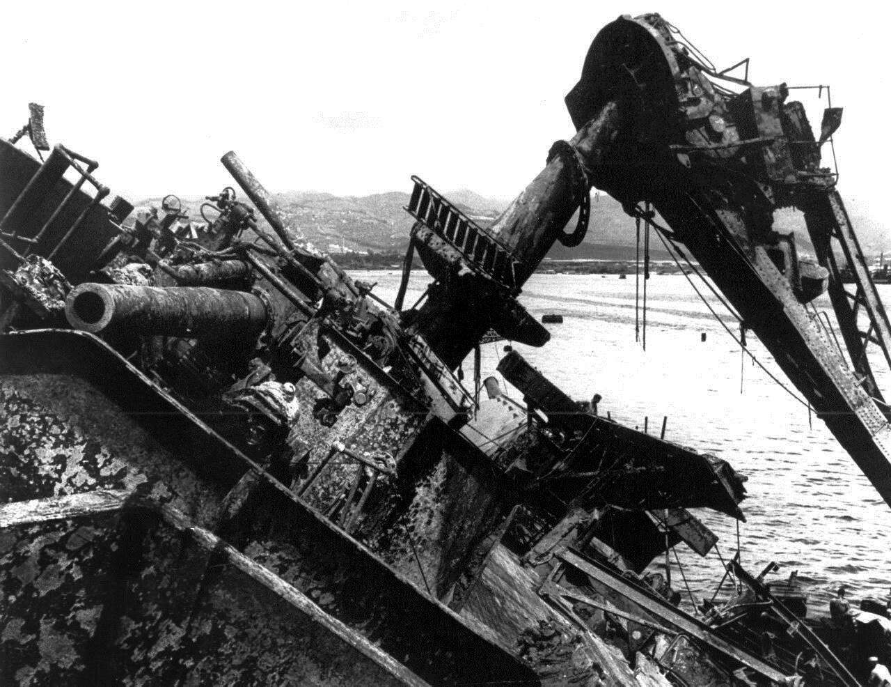 The capsized battleship USS Oklahoma