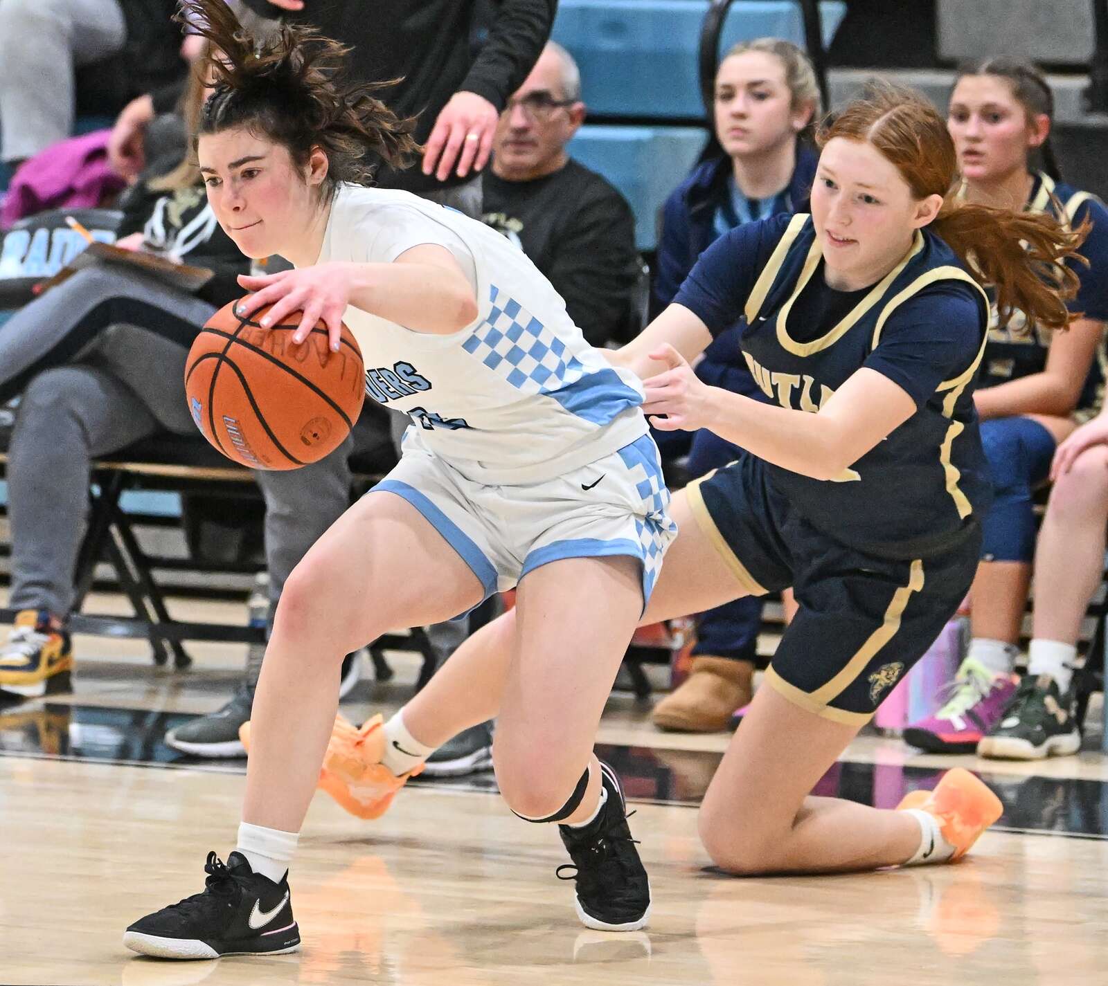 Seneca Valley’s Kaydence Kilhof gets fouled by Butler’s Ashton Huff