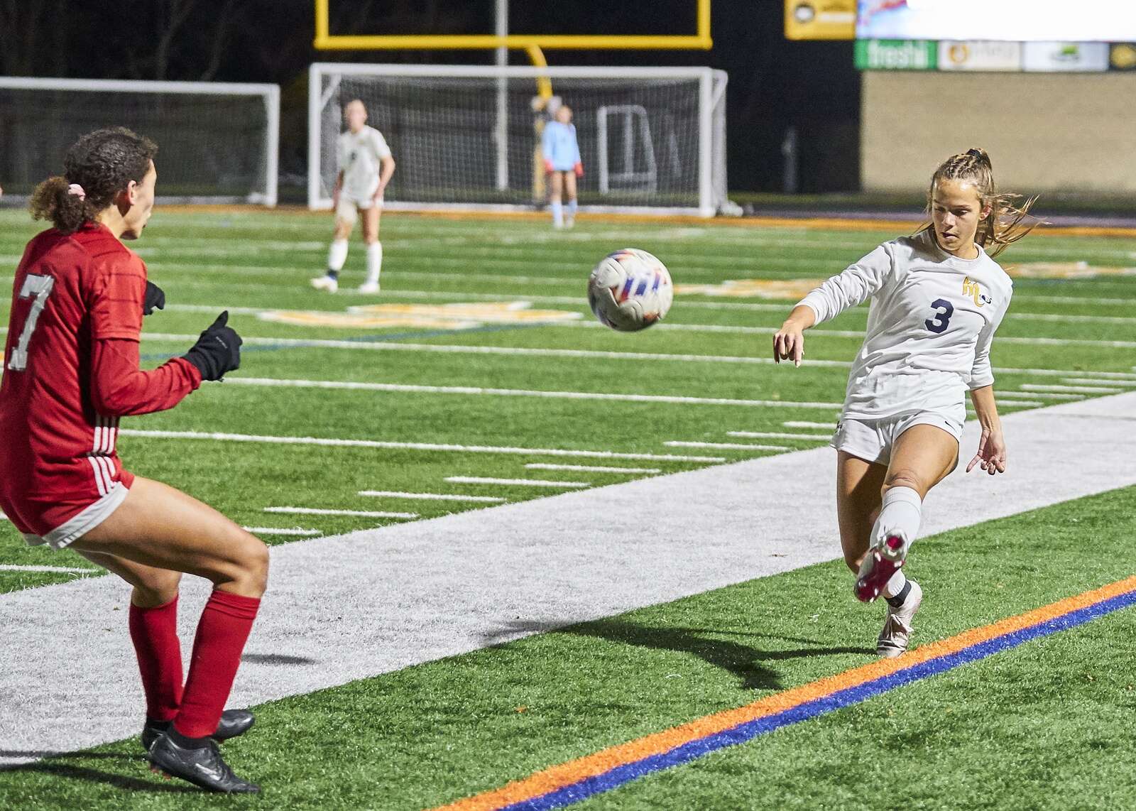 Mars' Addison Girdwood kicks the ball down field