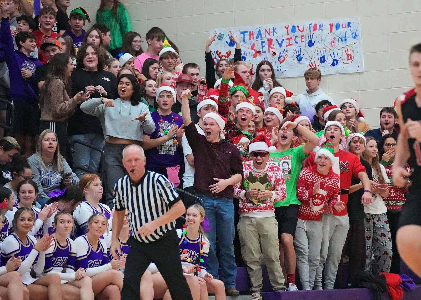 The student section at Karns City cheers on the Gremlin's boys basketball team