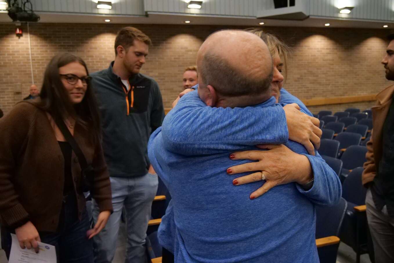 Departing Seneca Valley School Board members Jim Nickel and Kathy Whittle exchange a hug