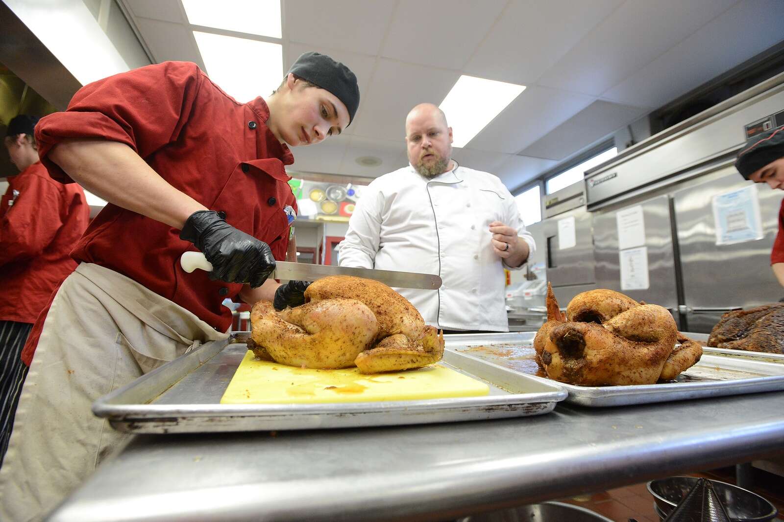 Butler County Area Vocational-Technical School culinary arts student carves up a turkey