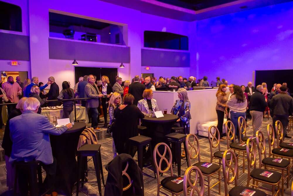 Guests attend a private event at the newly renovated Penn Theater