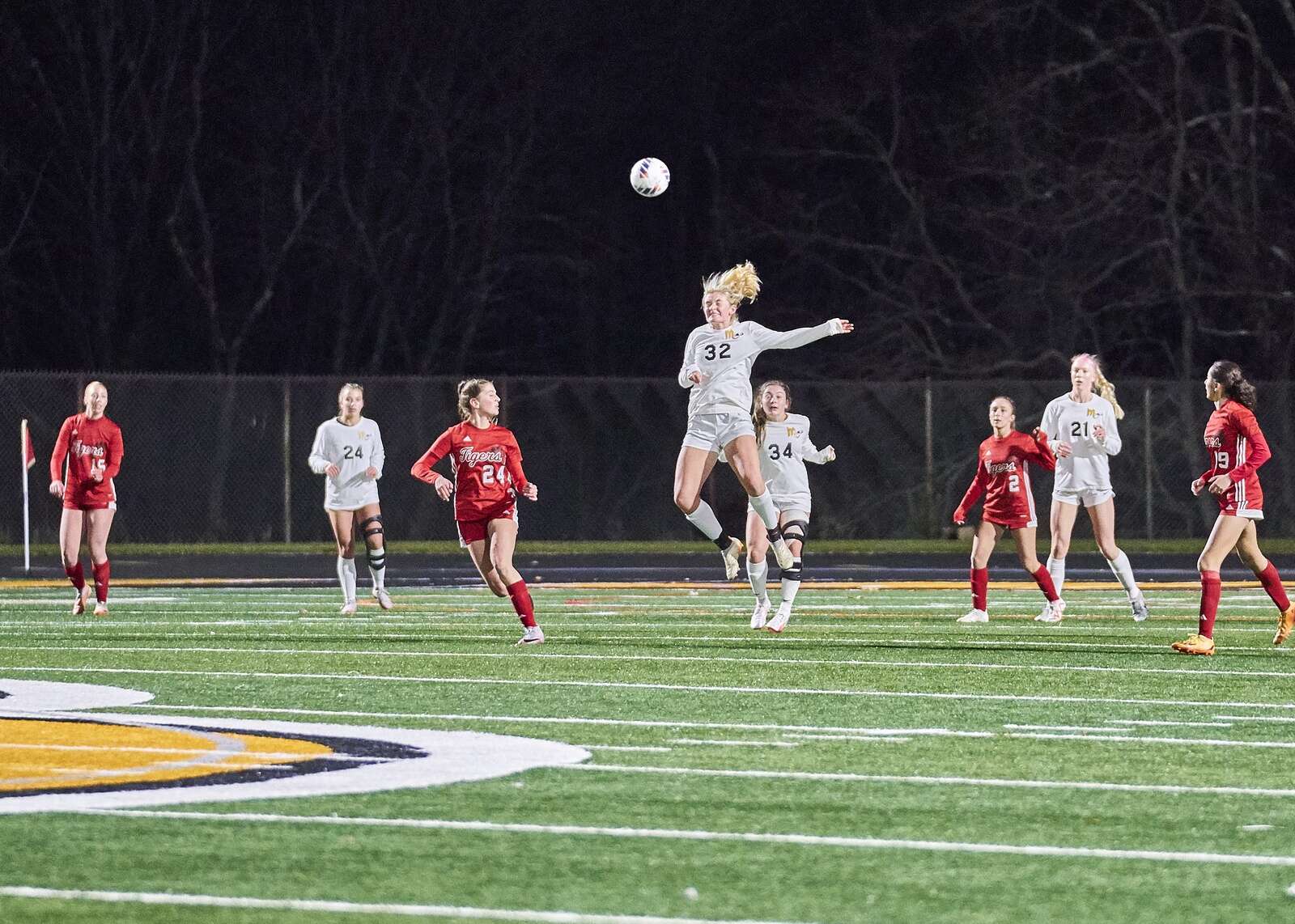 Mars' Ainsley Ray heads the ball
