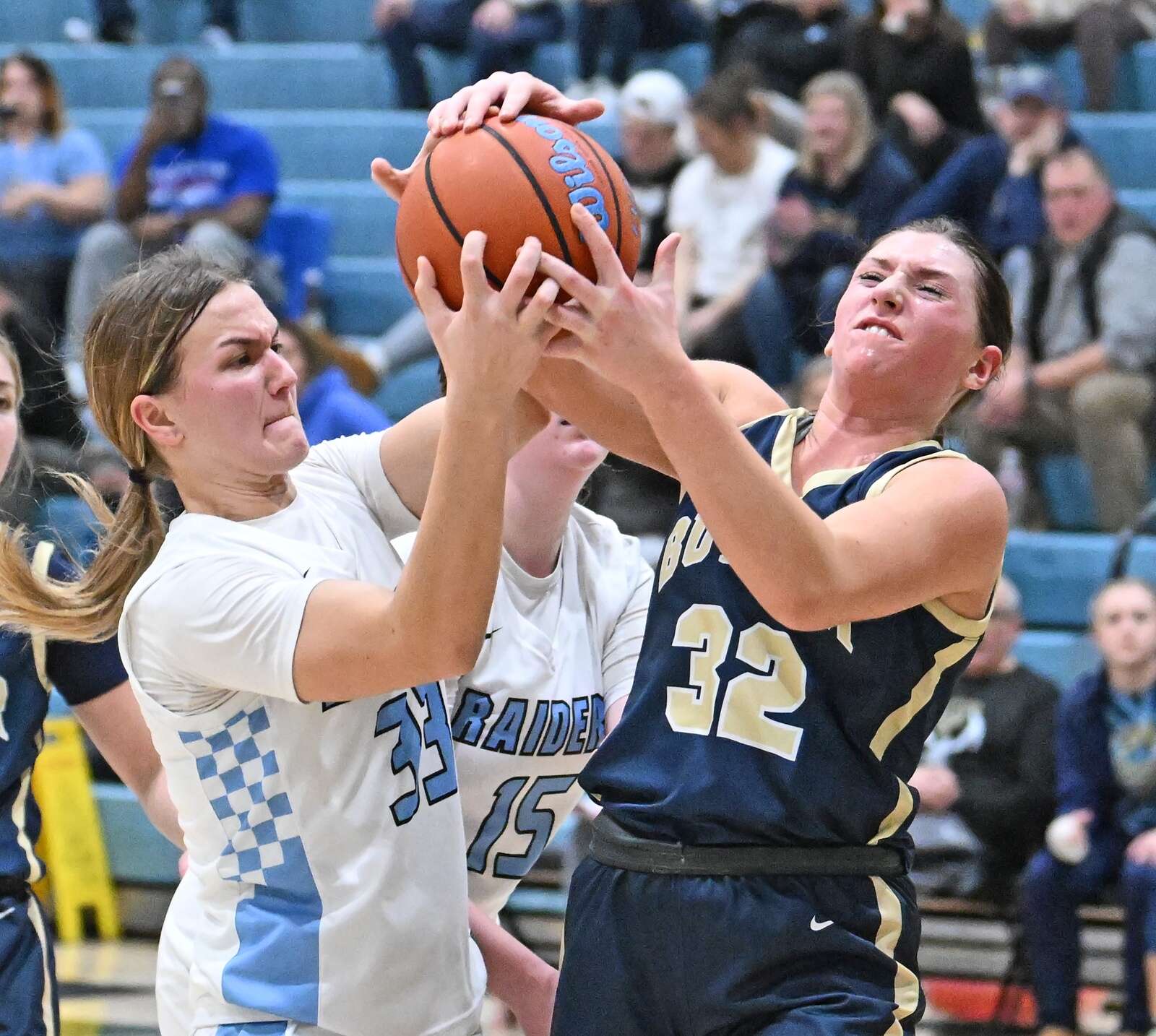 Seneca Valley’s Emerson Peffer fights for a ball against Butler’s Amelia McMichael