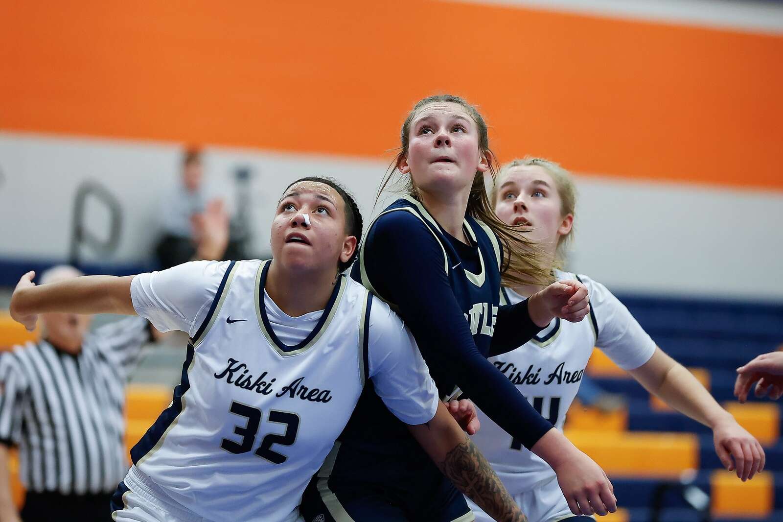 Avery Maier is boxed out by Kiski Area's Rikiya Garcia-Broaden during a free-throw attempt