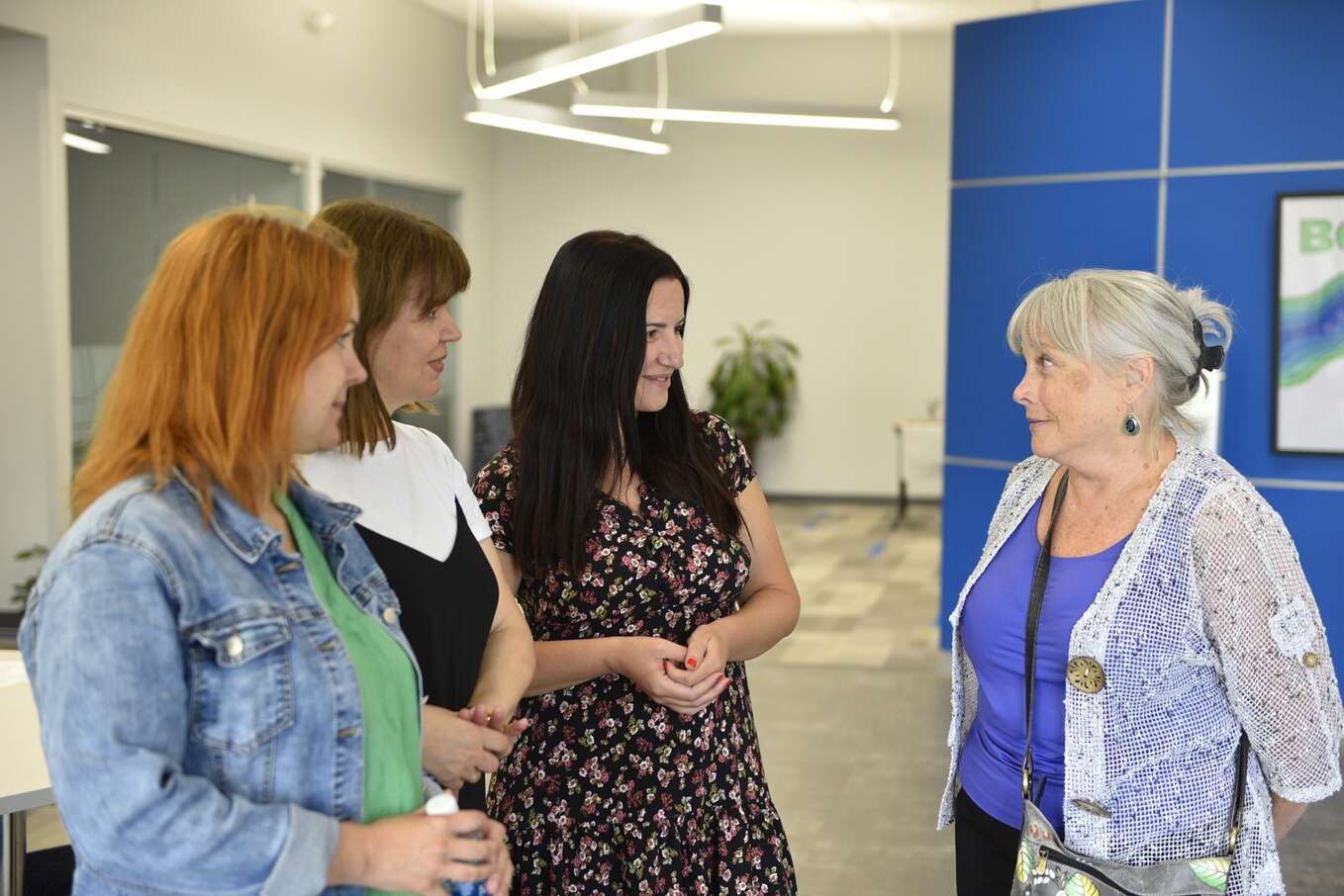 Ukrainian students speak with an English as a second language instructor at Butler County Community College