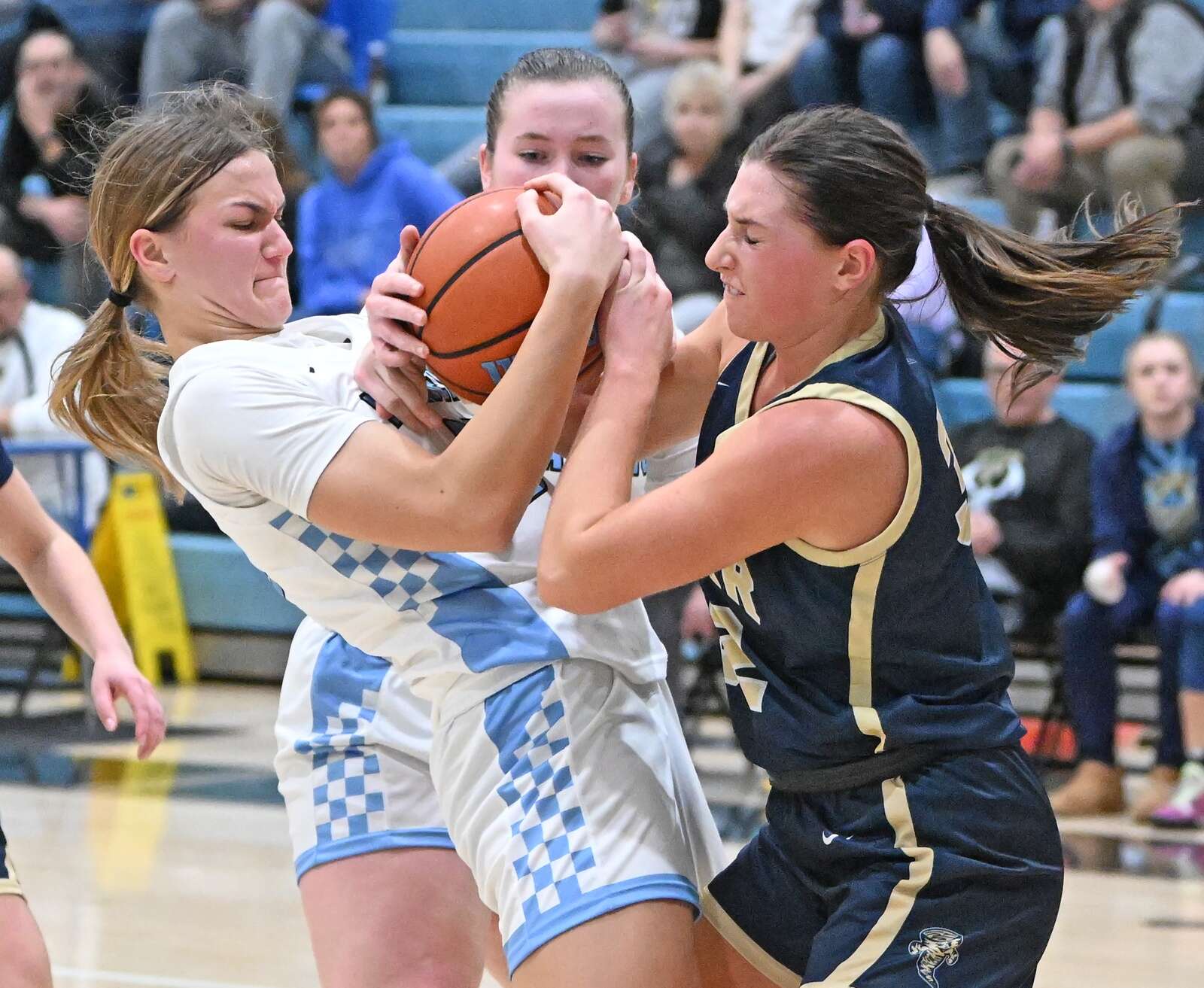 Seneca Valley’s Emerson Peffer fights for a ball against Butler’s Amelia McMichael
