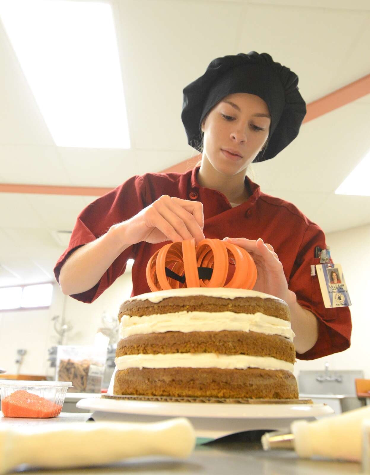 Butler County Area Vocational-Technical School culinary arts student makes a pumpkin cake