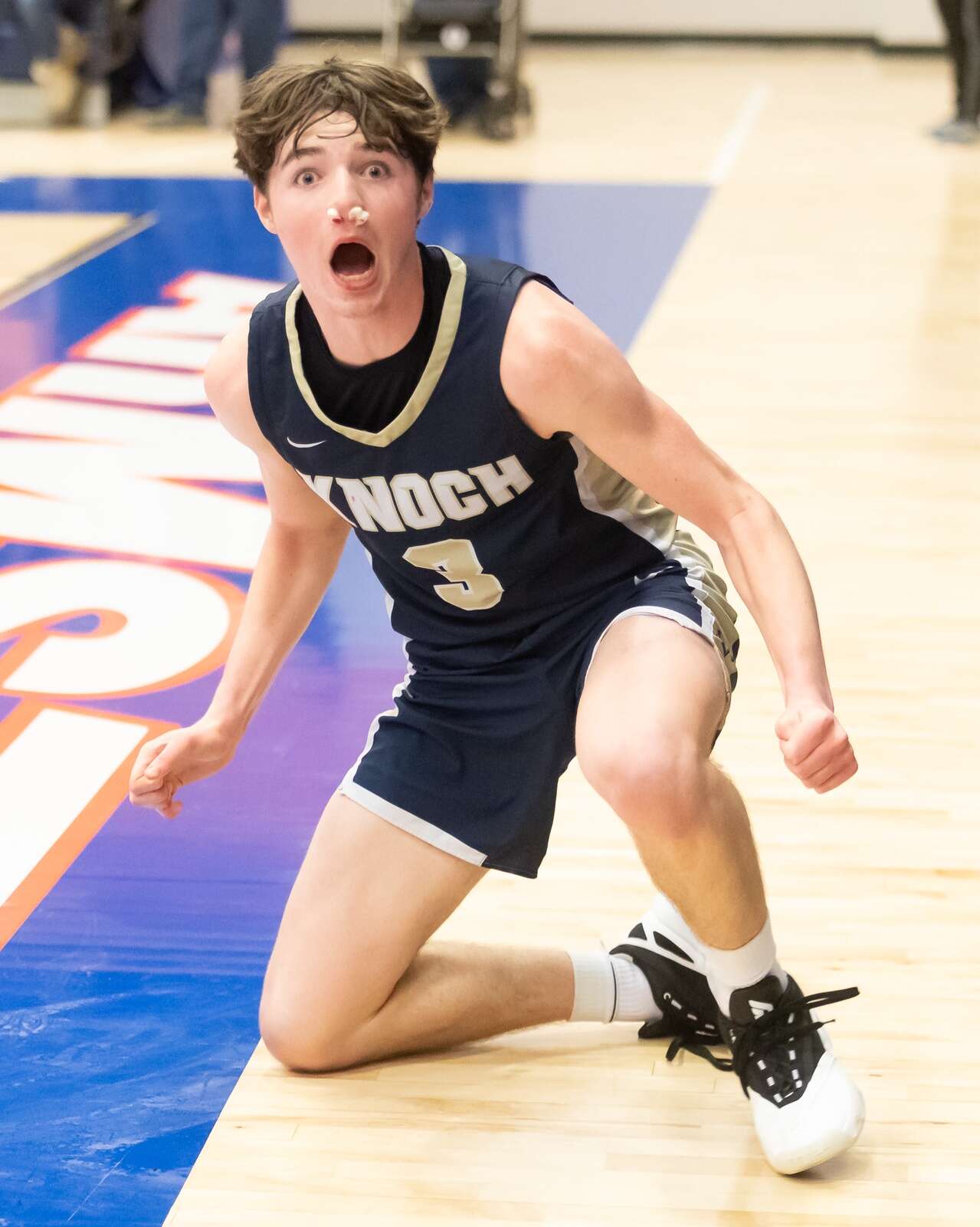 Knoch’s Jackson Bauman reacts after knocking down a contested lay-up