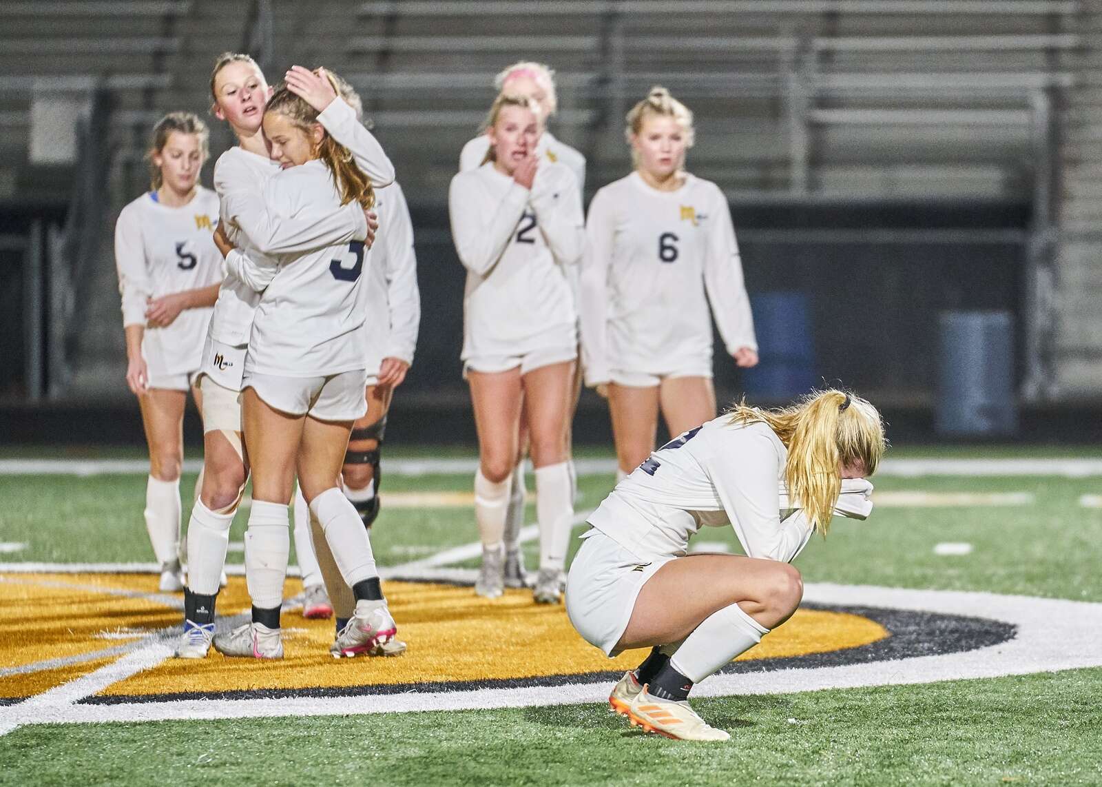 Mars' Ainsley Ray holds her head in her hands