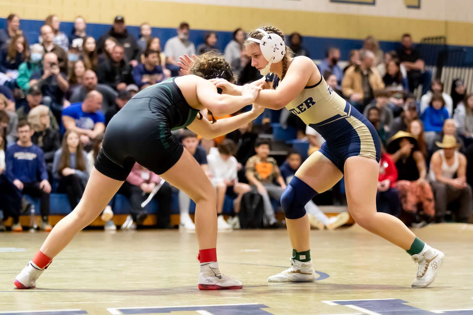 Butler's Anastasia Manchester grapples with Pine-Richland's Jarah Casciani