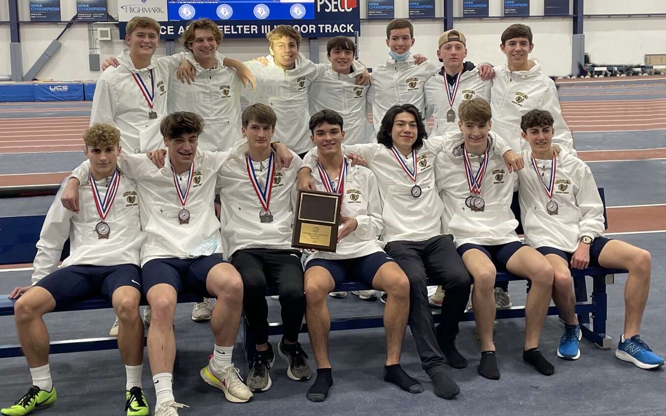 Butler’s boys indoor track and field team shows off its state championship award Sunday at Penn State University. Submitted Photo