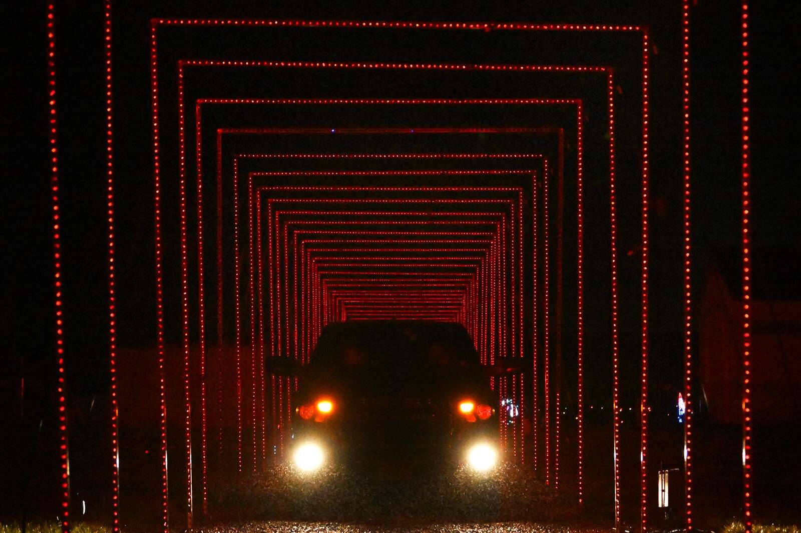 A car enters the light tunnel at the Big Butler Holiday Spectacular 